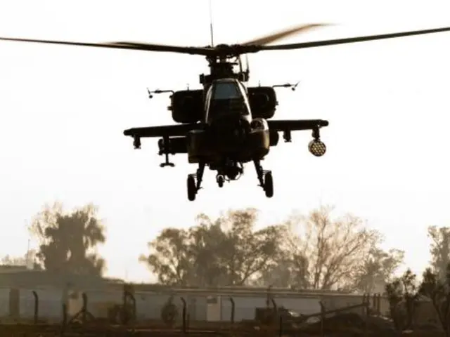 Person plummets from rooftop during work, requires helicopter evacuation to medical facility.