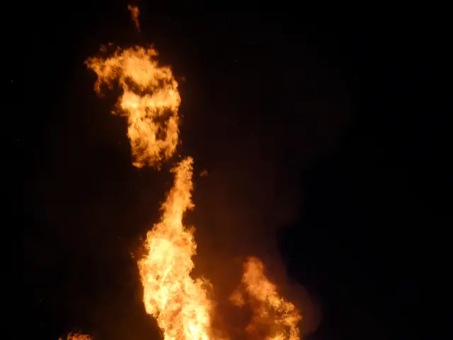 Individual sustained burn injuries while performing the process of loading a lighter.